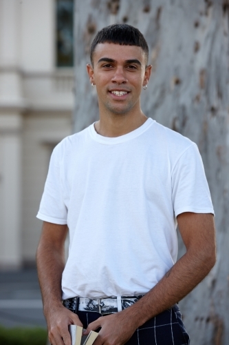 Young Indigenous Australian man enjoying time outdoors - Australian Stock Image