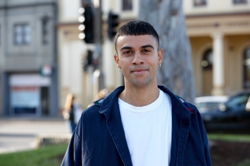 Young Indigenous Australian man enjoying time outdoors - Australian Stock Image