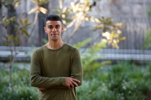 Young Indigenous Australian man enjoying time outdoors - Australian Stock Image