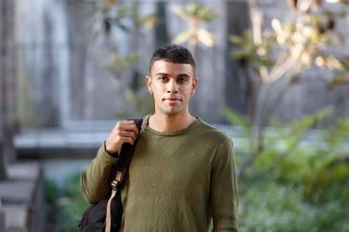 Young Indigenous Australian man enjoying time outdoors - Australian Stock Image