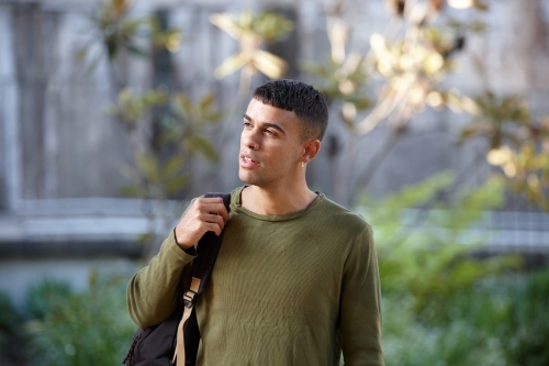 Young Indigenous Australian man enjoying time outdoors - Australian Stock Image