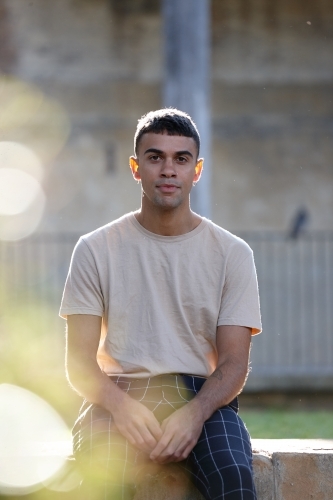 Young Indigenous Australian man enjoying time outdoors - Australian Stock Image