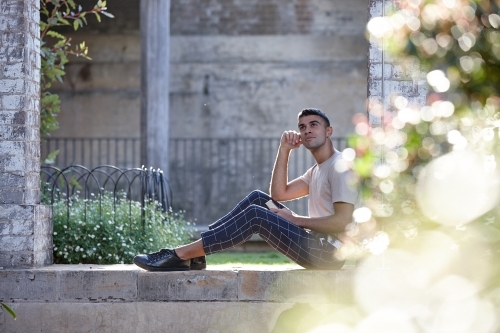 Young Indigenous Australian man enjoying time outdoors - Australian Stock Image