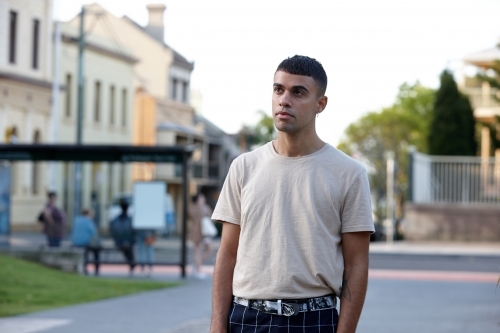 Young Indigenous Australian man enjoying time outdoors - Australian Stock Image