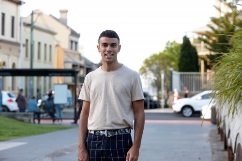 Young Indigenous Australian man enjoying time outdoors - Australian Stock Image