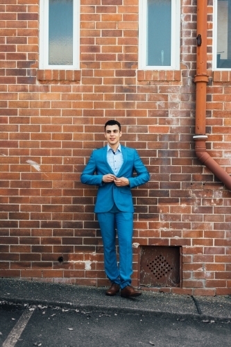 young man in blue suit