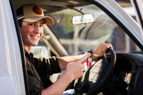 Young P plater provisional driver with the keys for his first car - a ute - Australian Stock Image