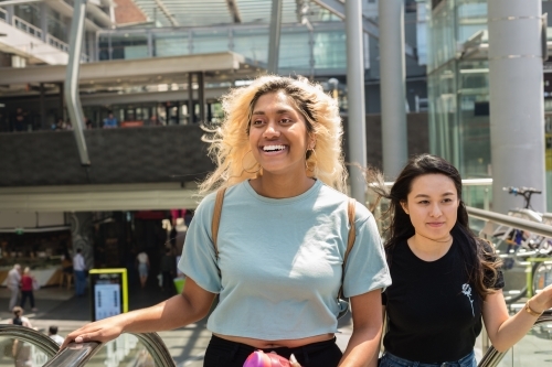 young students at the train station - Australian Stock Image