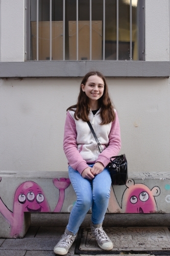 Young teenage girl shopping in town - Australian Stock Image