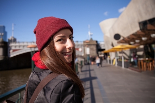 Young Woman Enjoying Winter Sunshine - Australian Stock Image