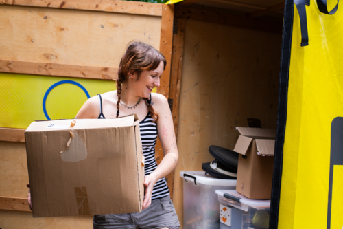 young woman moving house - Australian Stock Image