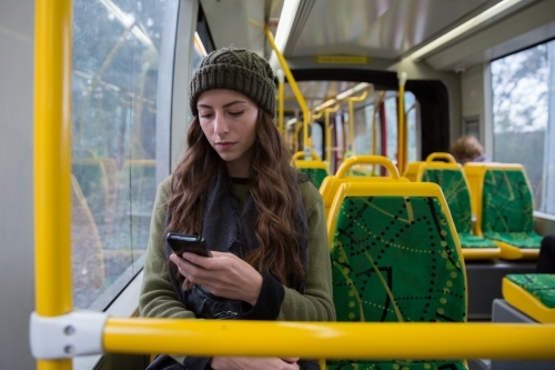 Young Woman Riding the Tram - Australian Stock Image