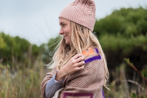 Young woman's profile outdoors. - Australian Stock Image
