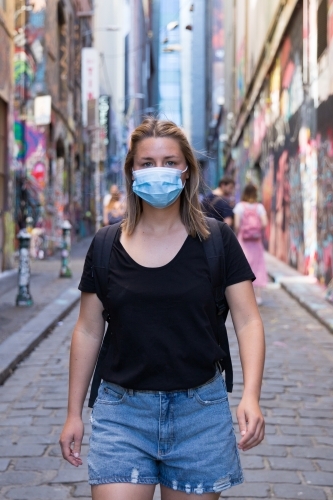 Young Woman Wearing a Face Mask Exploring Melbourne Lanes