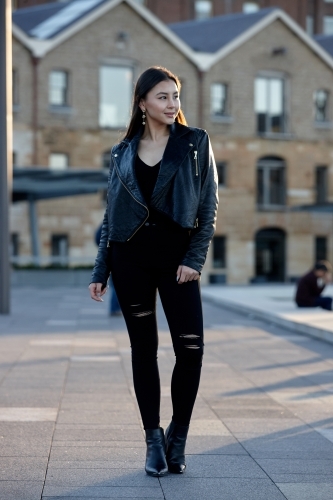 Young woman wearing leather jacket