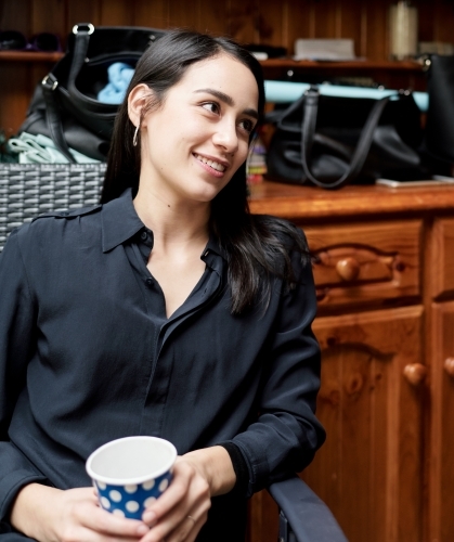 Young Woman with Straight Dark Hair - Australian Stock Image