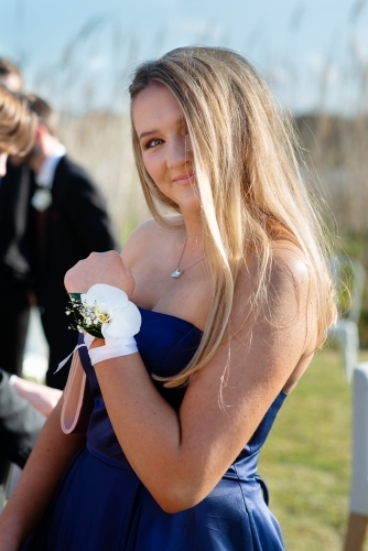 young woman with wrist corsage - Australian Stock Image
